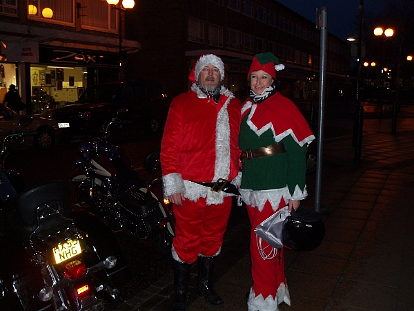 [Santa and his huge elf.jpg]